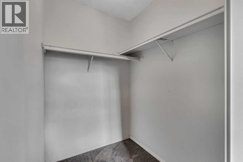 104, 7172 Coach Hill Road SW — photo 28