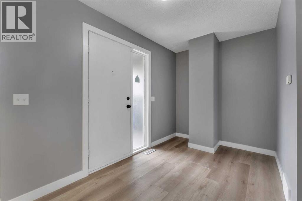 104, 7172 Coach Hill Road SW — photo 4