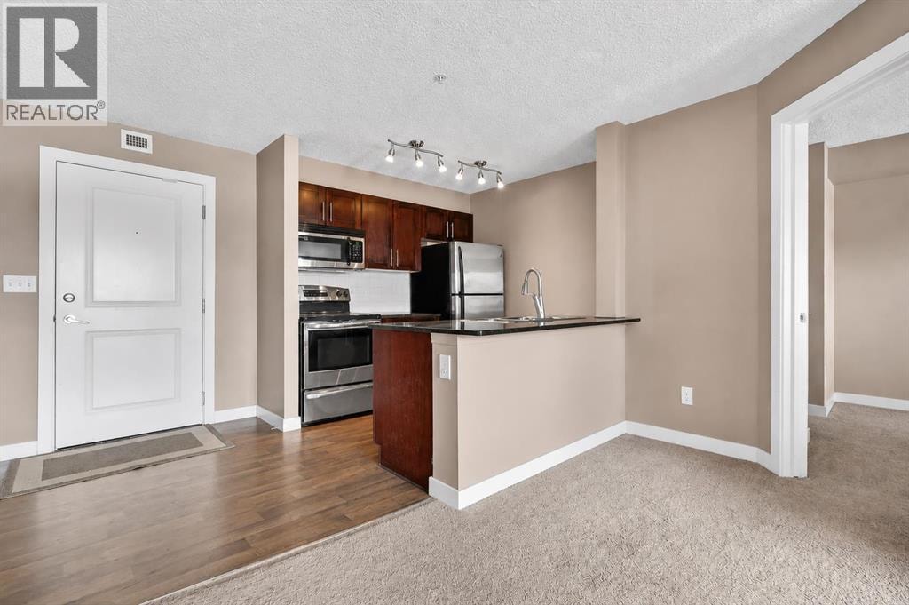 4317, 403 Mackenzie Way SW — photo 16