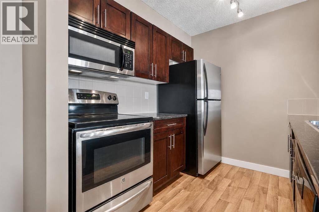 4317, 403 Mackenzie Way SW — photo 18