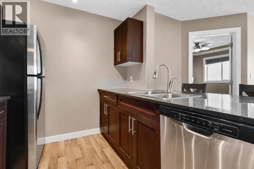 4317, 403 Mackenzie Way SW — photo 20