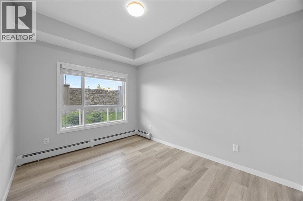 105, 200 Harvest Hills Place NE — photo 23