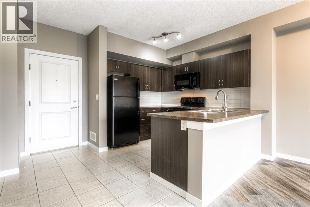 208, 100 Cranfield Common SE — photo 4