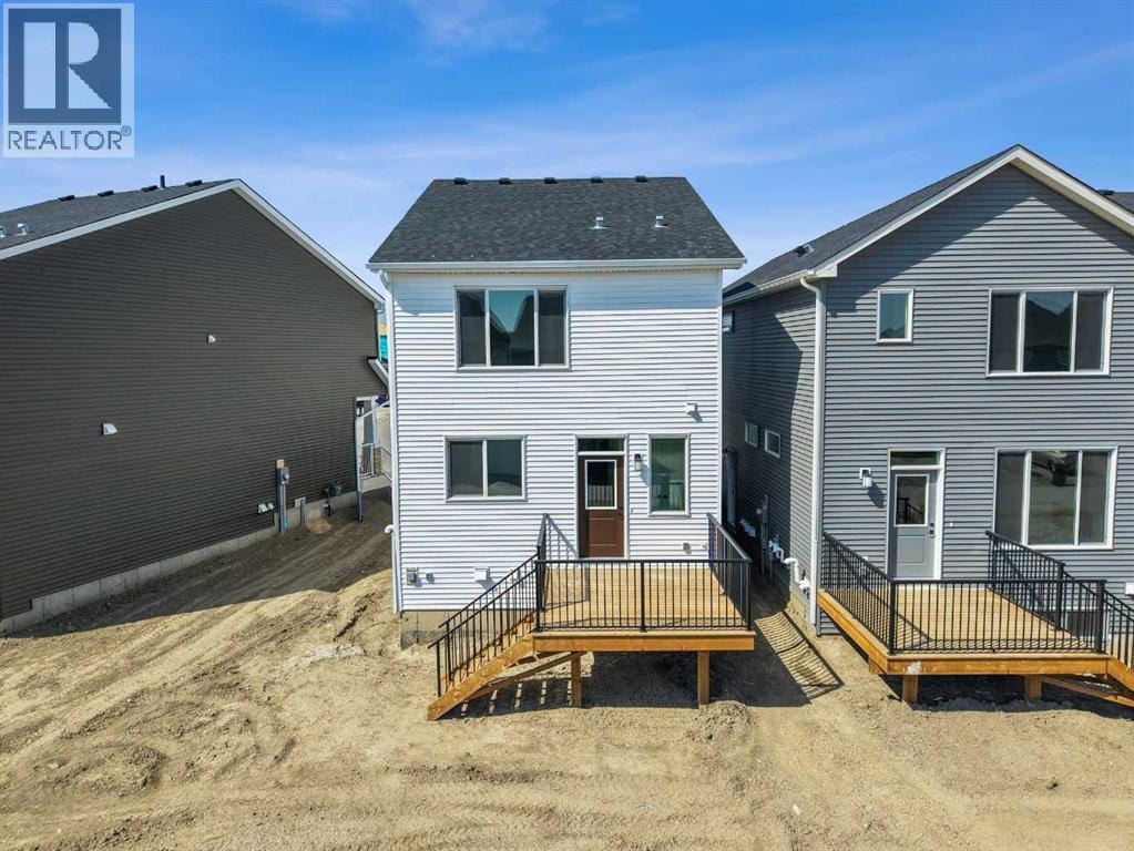 568 Buffaloberry Manor SE — photo 46