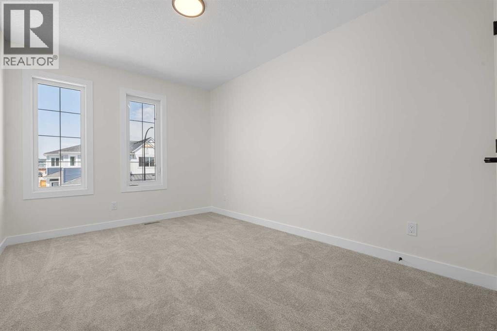 568 Buffaloberry Manor SE — photo 30
