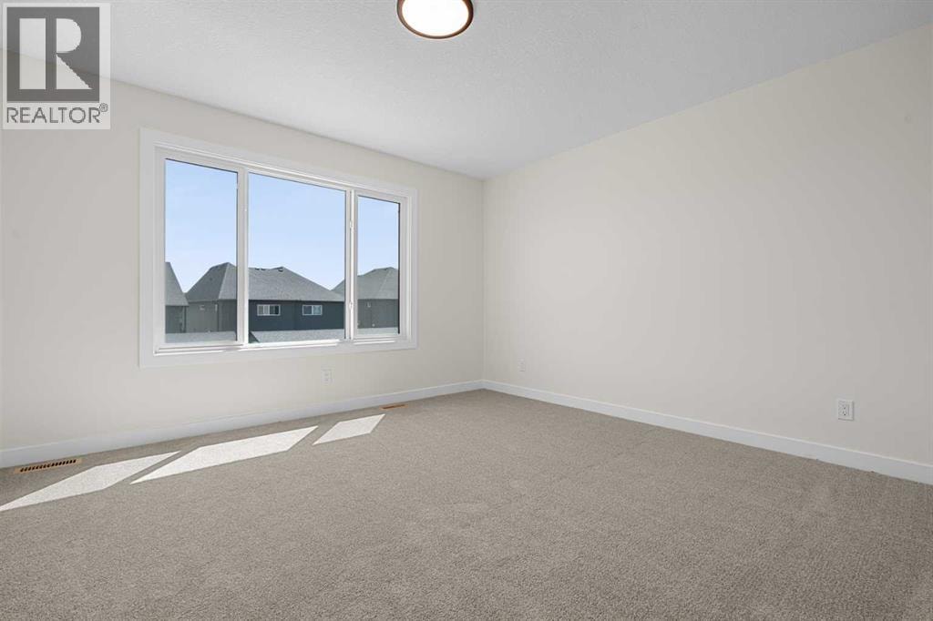 568 Buffaloberry Manor SE — photo 21