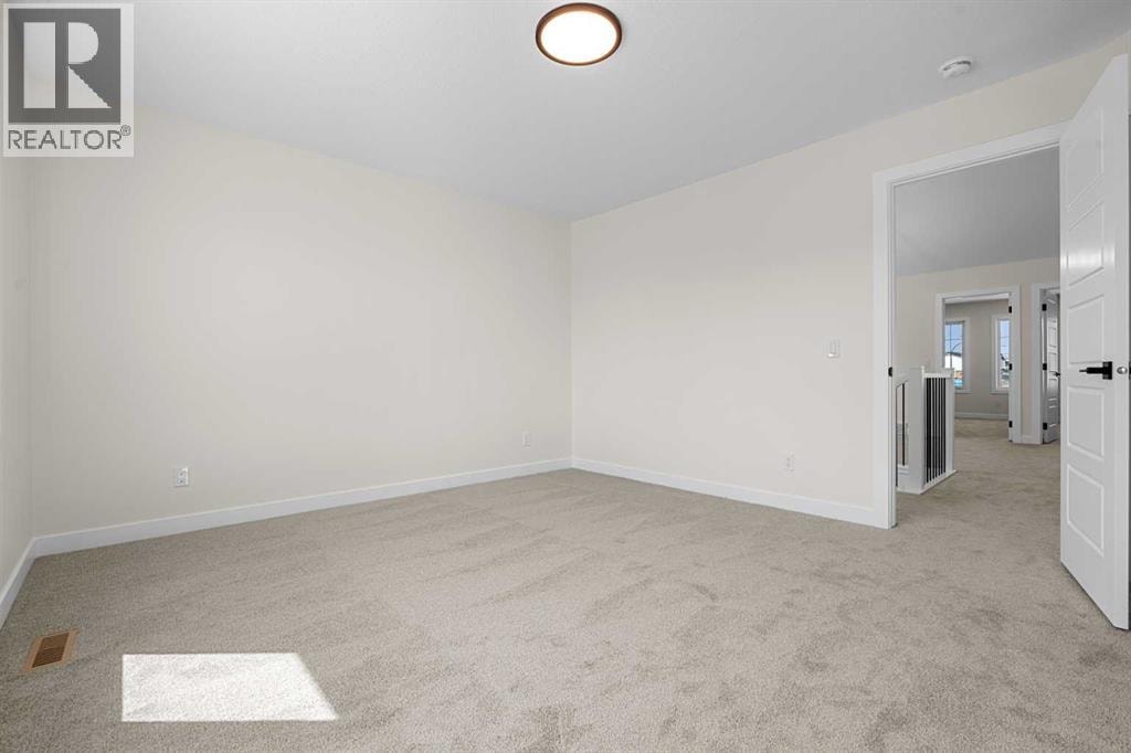 568 Buffaloberry Manor SE — photo 23