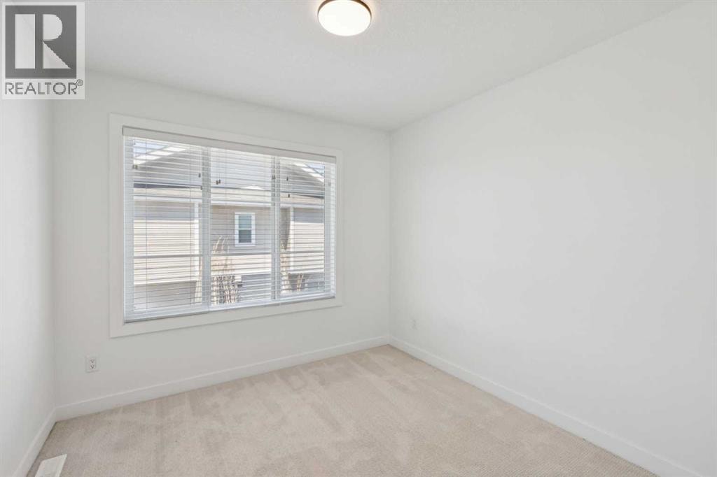 402, 669 Savanna Boulevard NE — photo 25