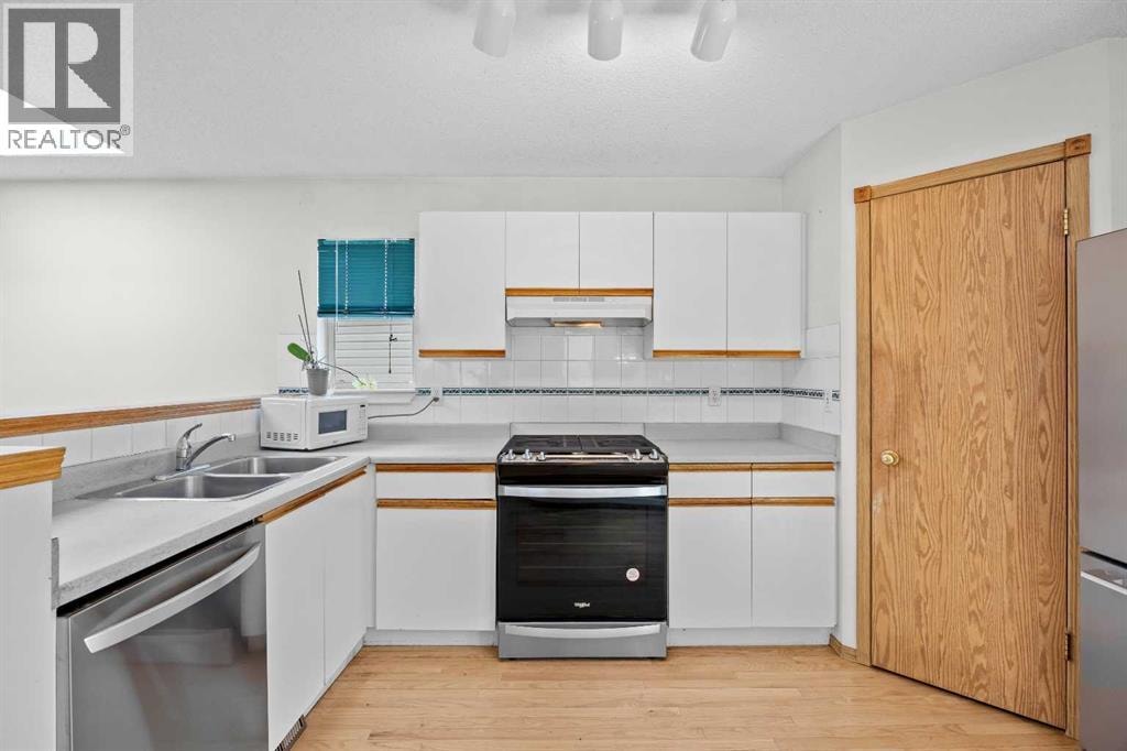 242 Hidden Spring Mews NW — photo 11