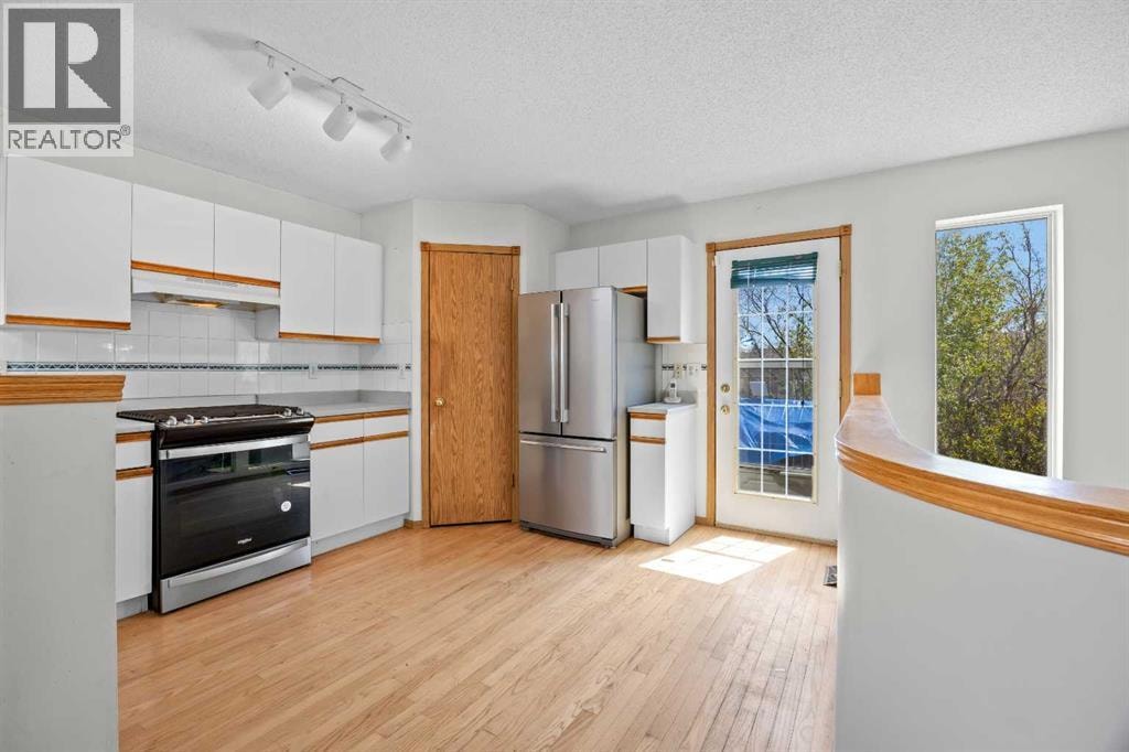 242 Hidden Spring Mews NW — photo 13