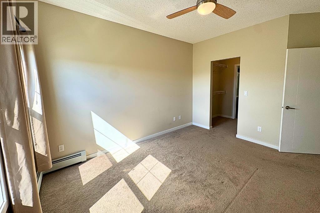208, 402 Marquis Lane SE — photo 15