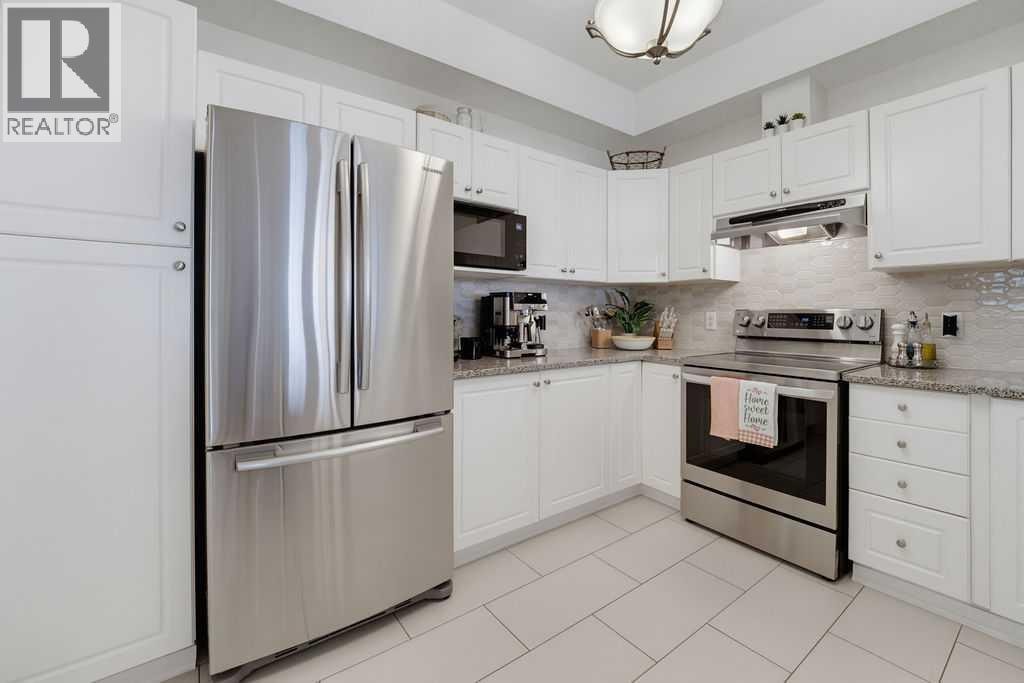 233, 223 Tuscany Springs Boulevard NW — photo 4