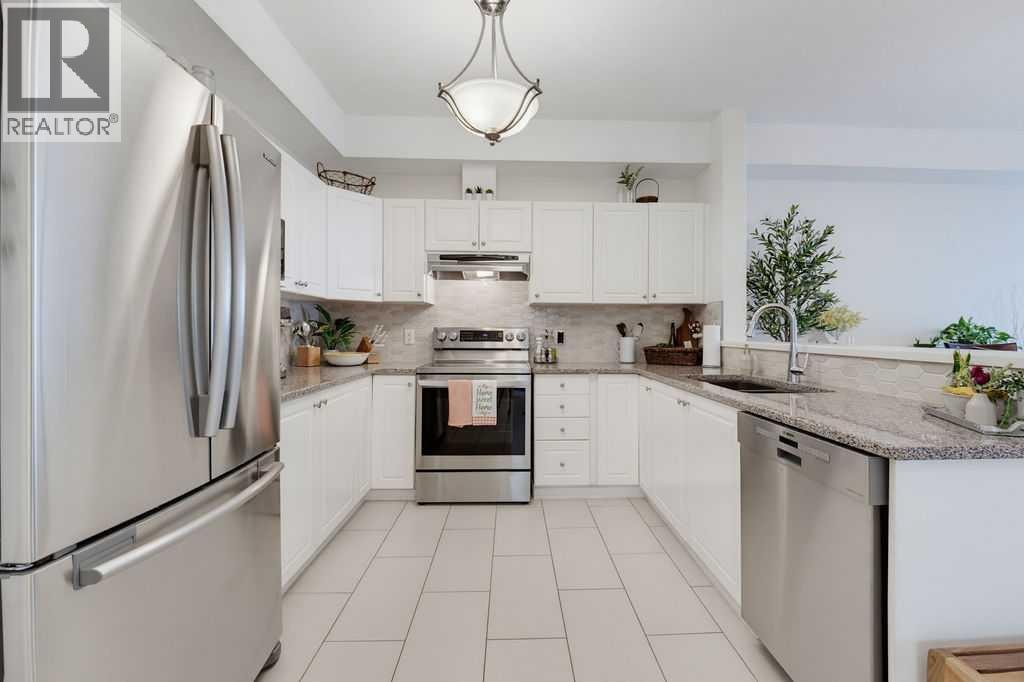 233, 223 Tuscany Springs Boulevard NW — photo 3