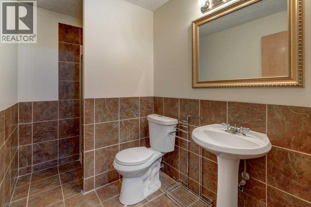 182 Harvest Creek Close NE — photo 31