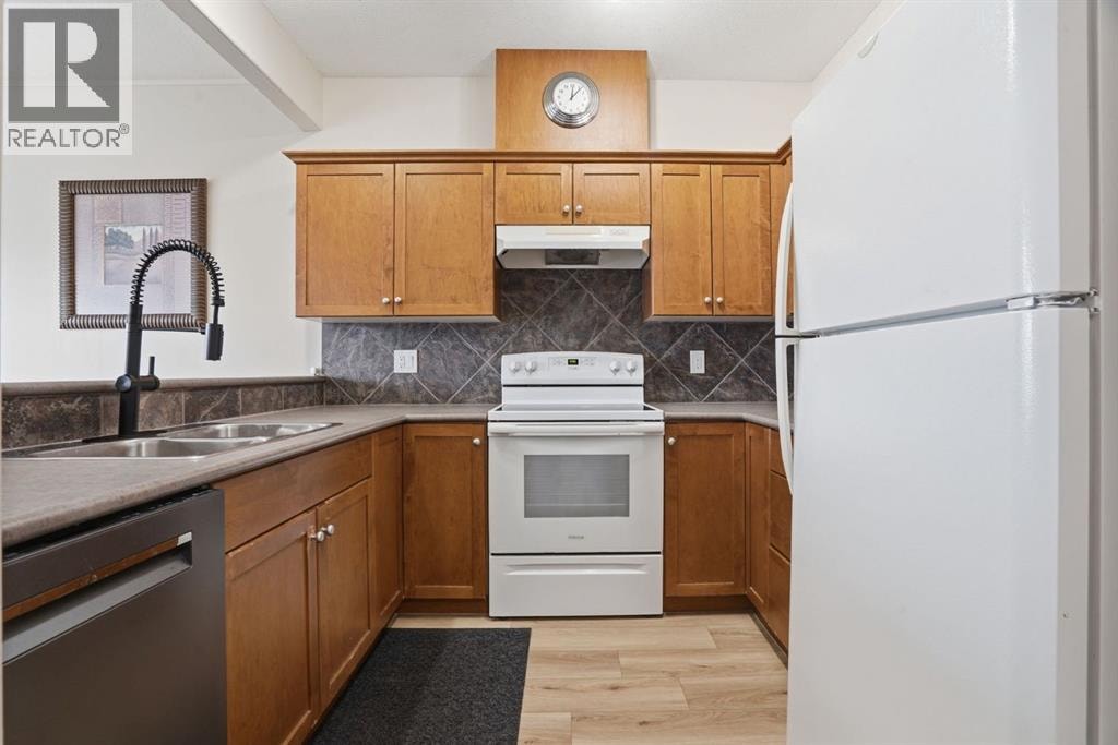 905, 720 Willowbrook Road NW — photo 16