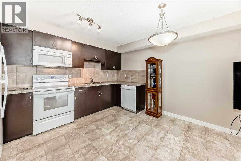 303, 250 Sage Valley Road NW — photo 5