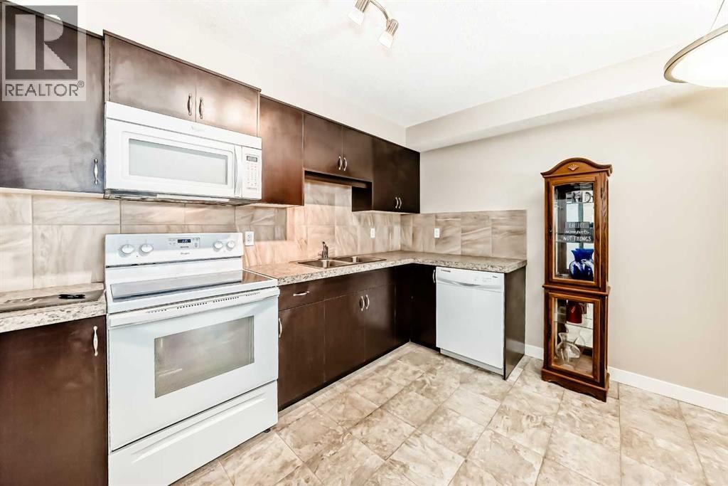 303, 250 Sage Valley Road NW — photo 10