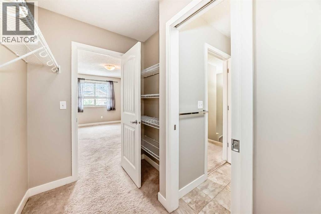 303, 250 Sage Valley Road NW — photo 25