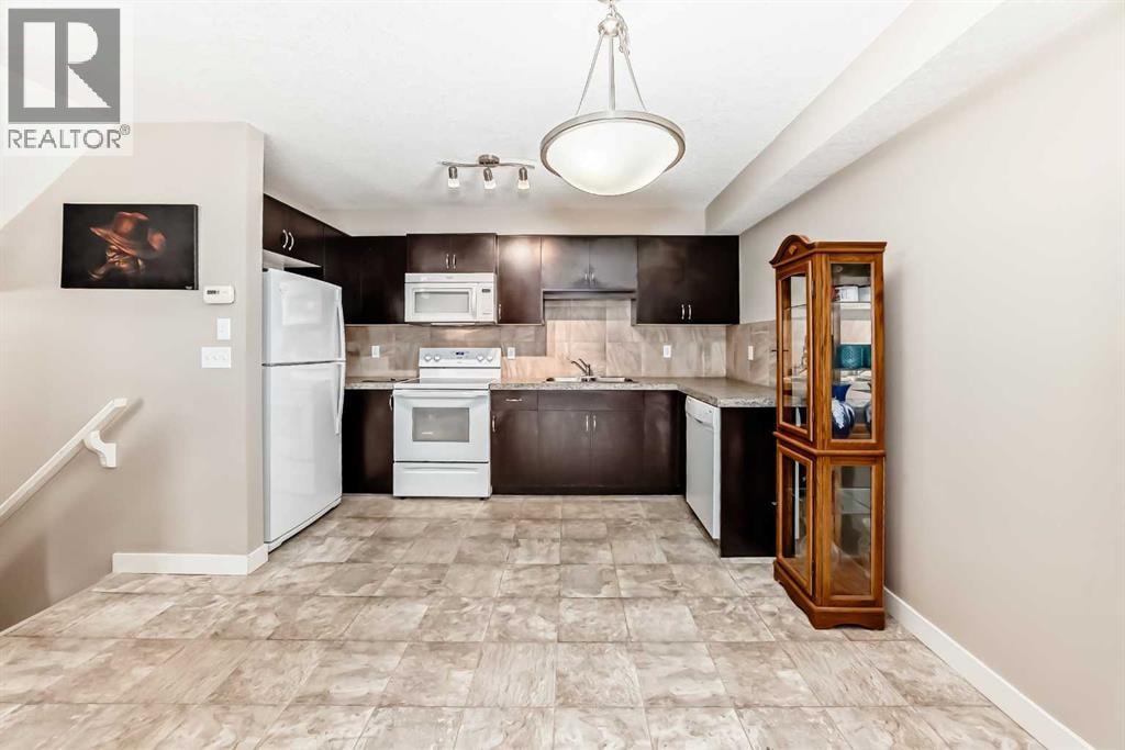 303, 250 Sage Valley Road NW — photo 6
