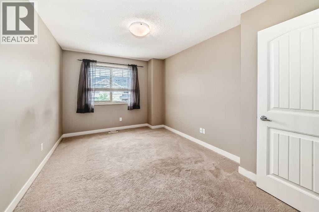 303, 250 Sage Valley Road NW — photo 22