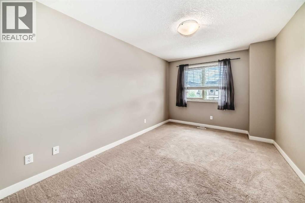303, 250 Sage Valley Road NW — photo 21