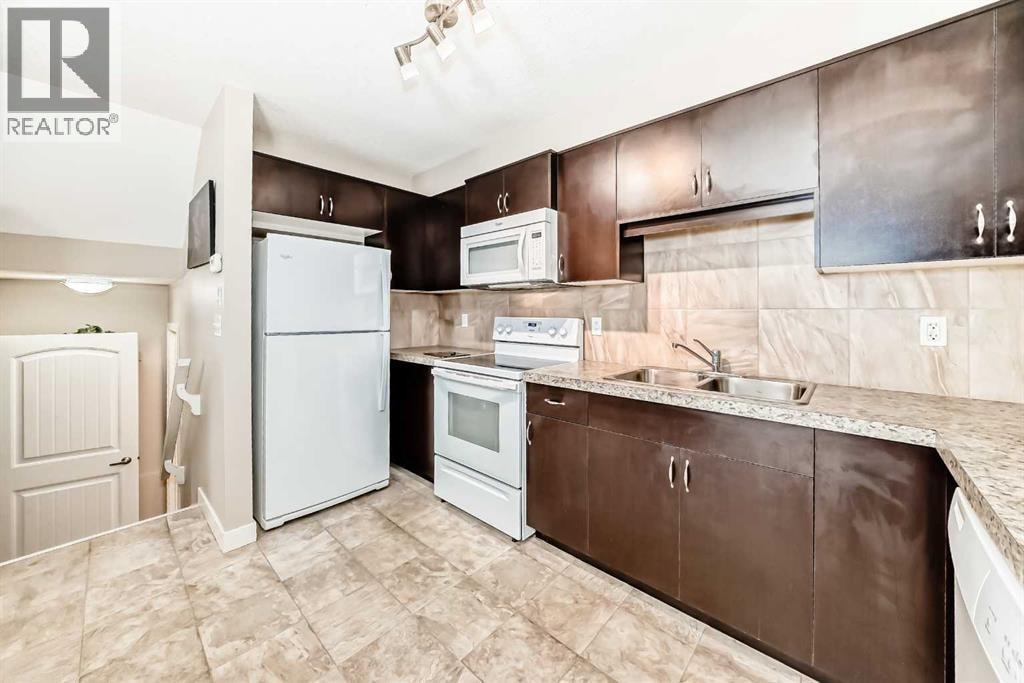 303, 250 Sage Valley Road NW — photo 9