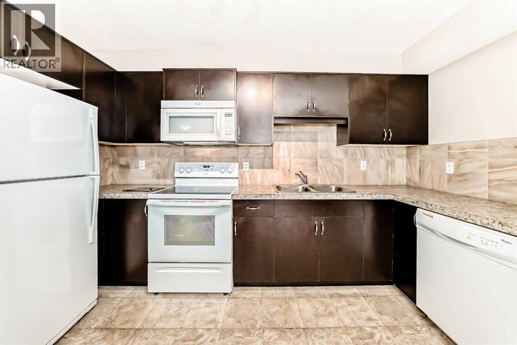 303, 250 Sage Valley Road NW — photo 8