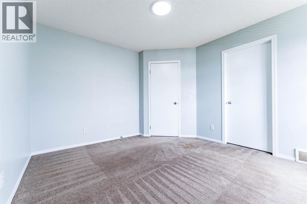 45 Tuscany Springs Garden NW — photo 16