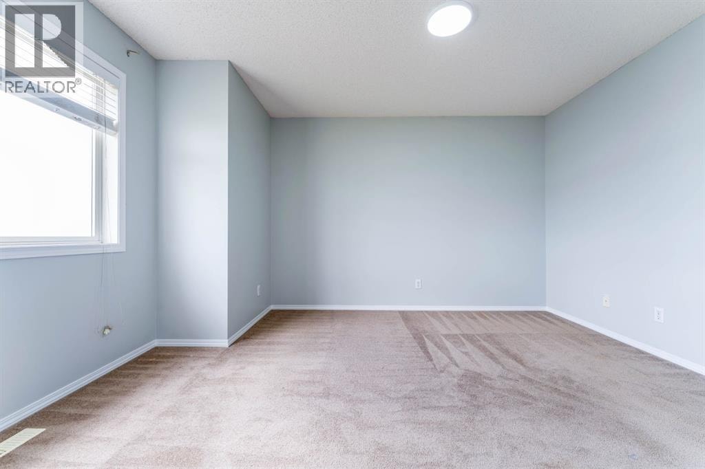 45 Tuscany Springs Garden NW — photo 23