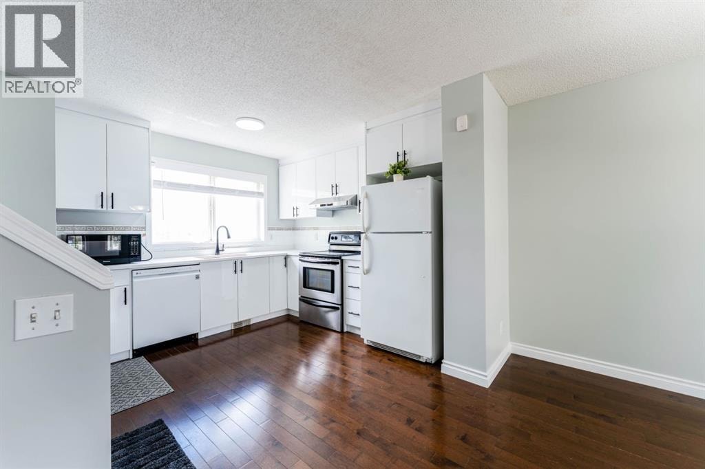 45 Tuscany Springs Garden NW — photo 7