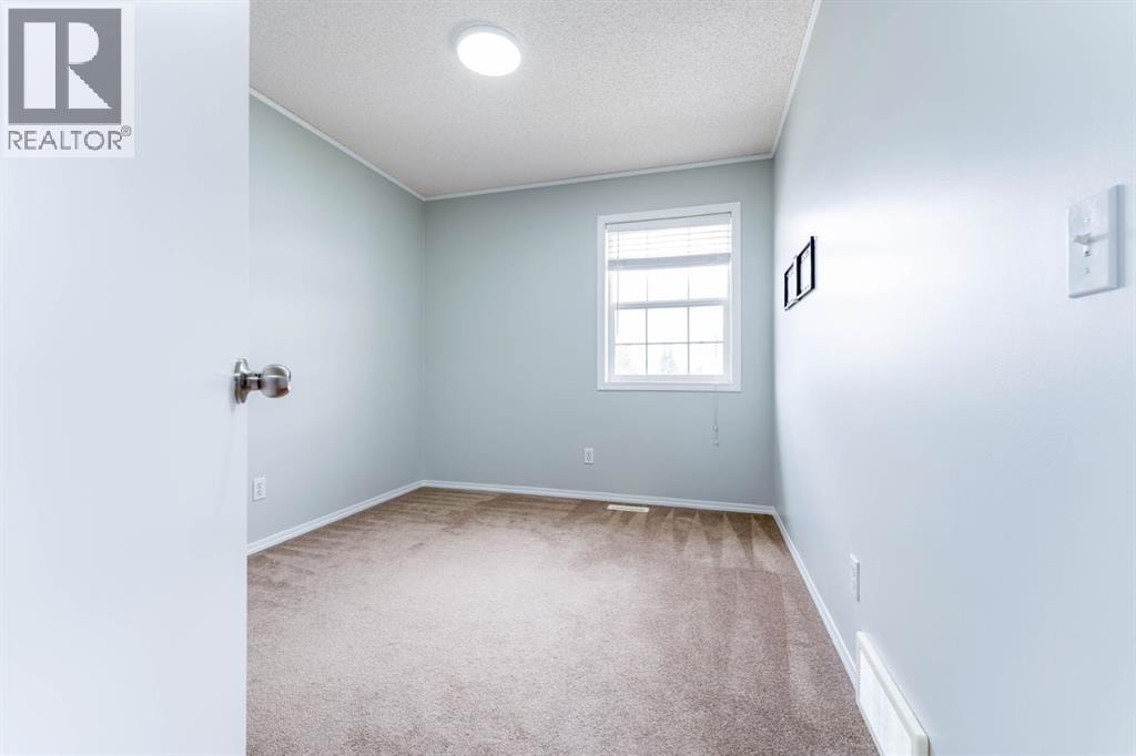 45 Tuscany Springs Garden NW — photo 25