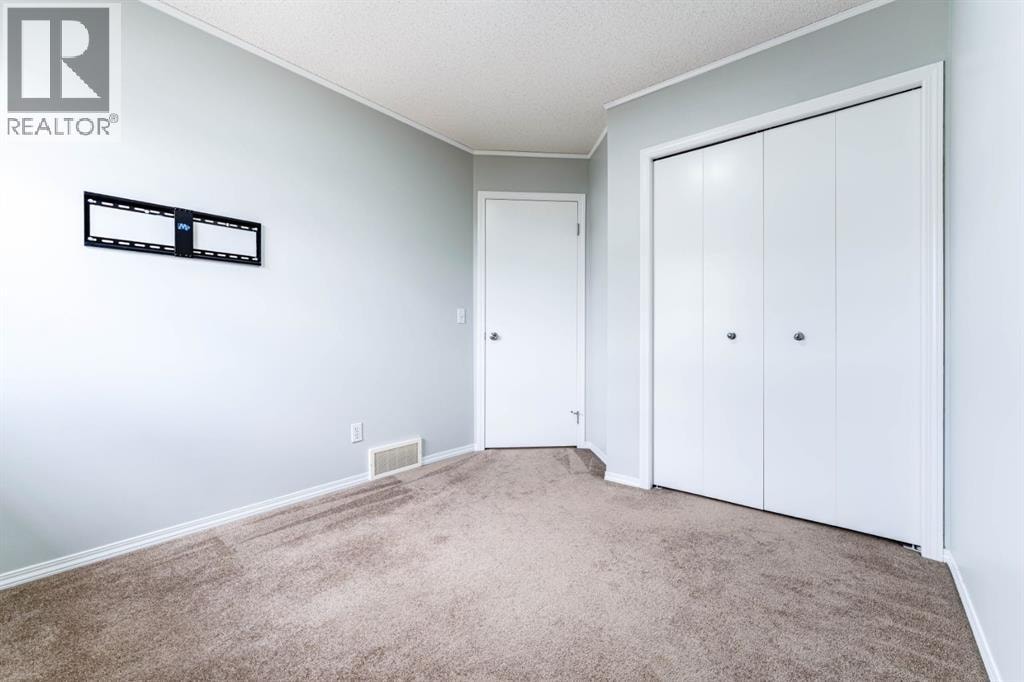 45 Tuscany Springs Garden NW — photo 27