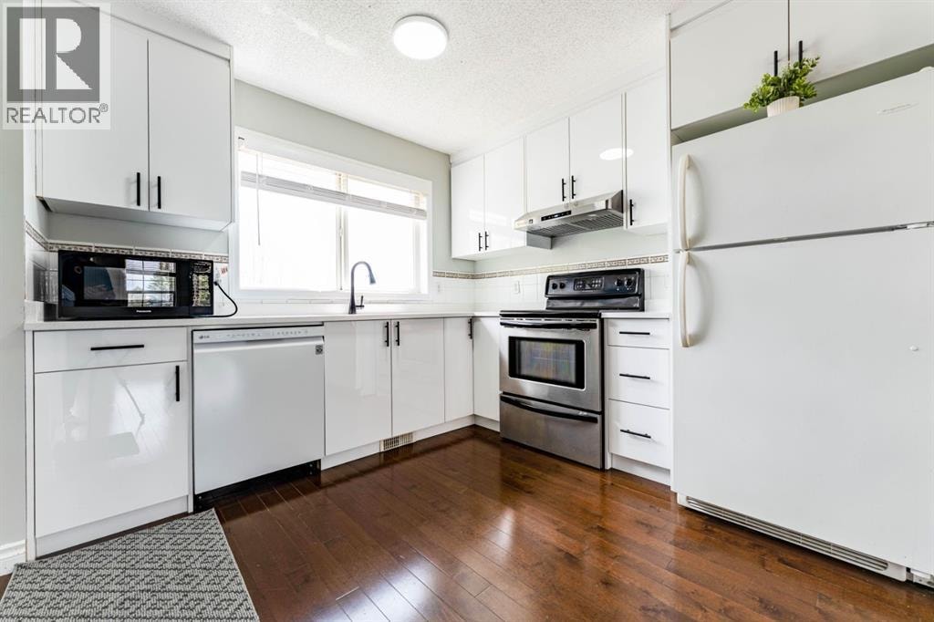 45 Tuscany Springs Garden NW — photo 8