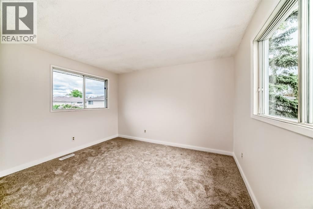 66, 1155 Falconridge Drive NE — photo 5