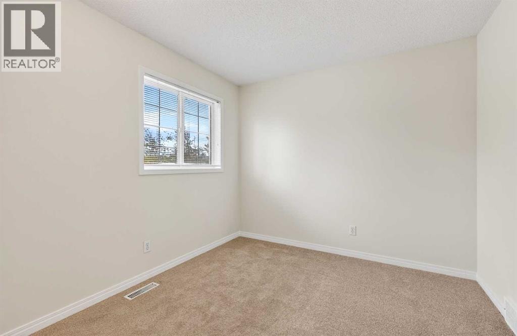 98 River Rock Crescent SE — photo 36