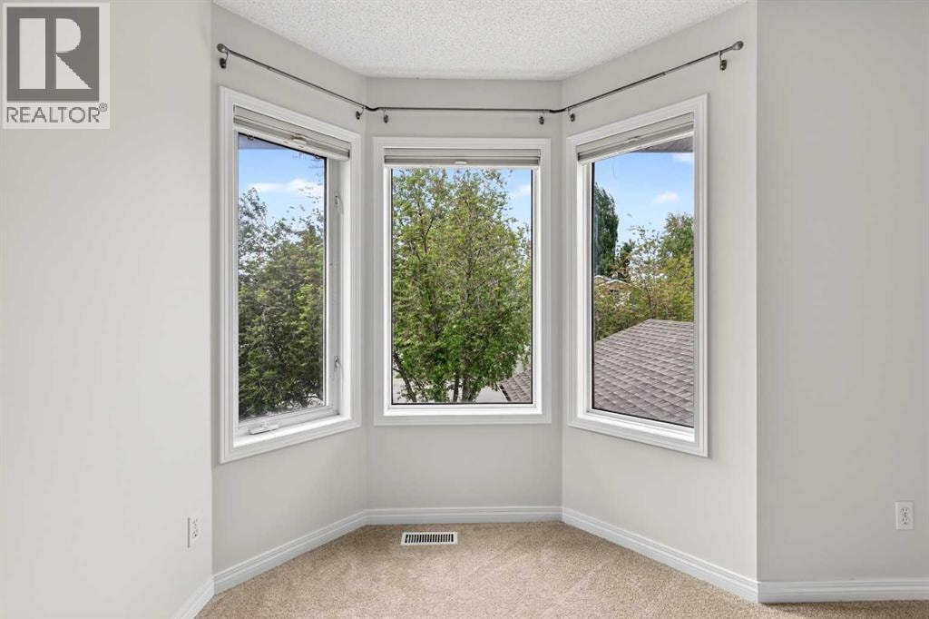 98 River Rock Crescent SE — photo 30