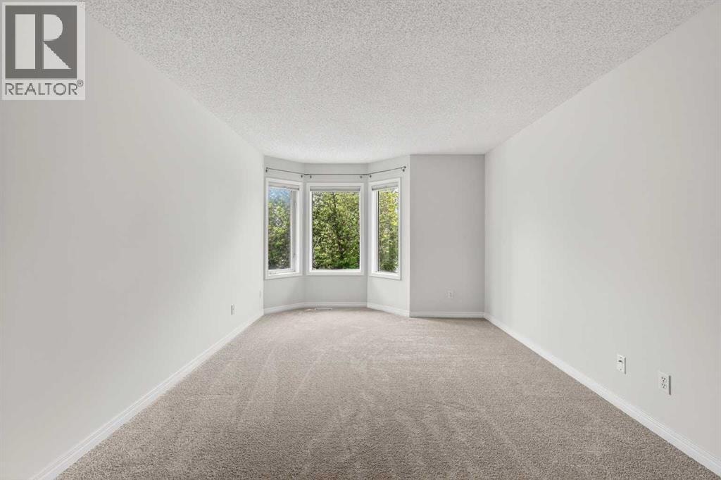 98 River Rock Crescent SE — photo 28