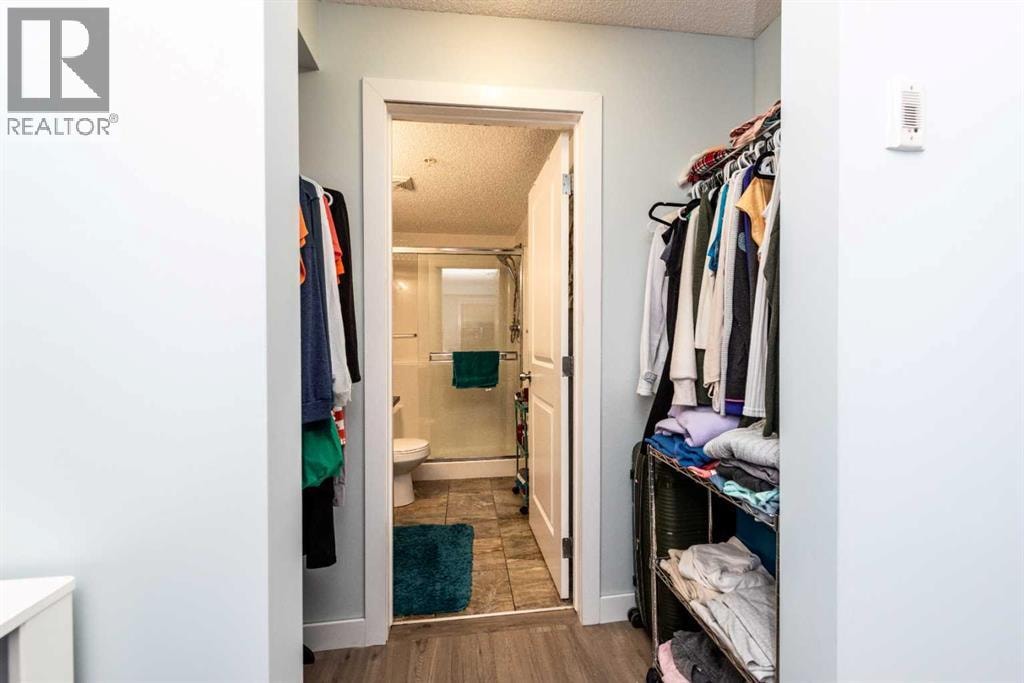 8112, 403 Mackenzie Way SE — photo 17