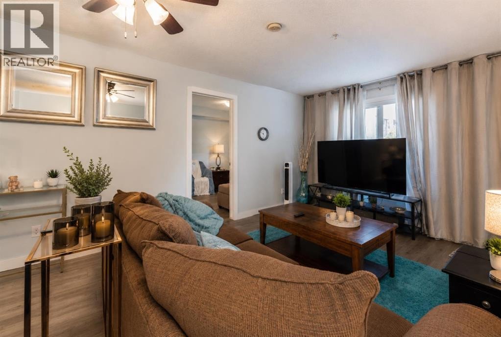 8112, 403 Mackenzie Way SE — photo 11