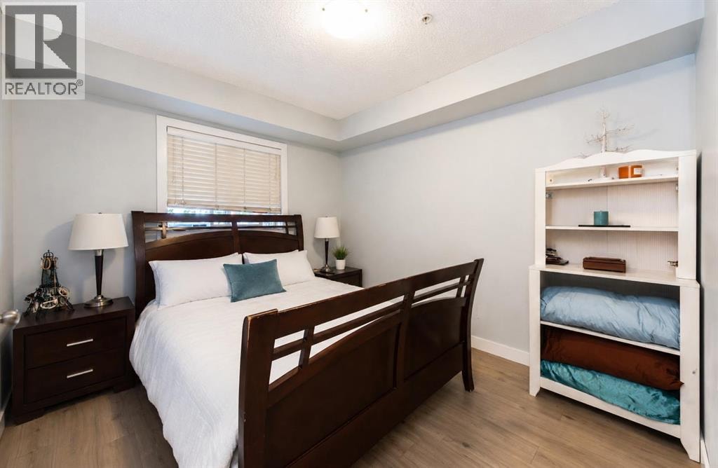 8112, 403 Mackenzie Way SE — photo 15