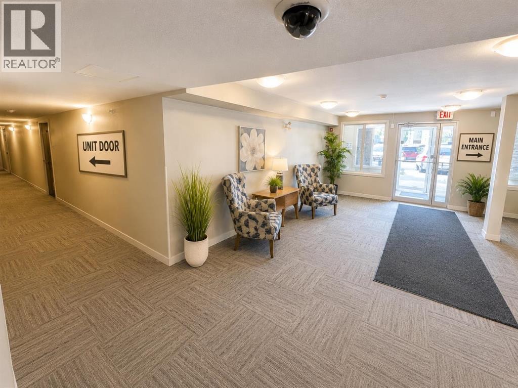 8112, 403 Mackenzie Way SE — photo 9