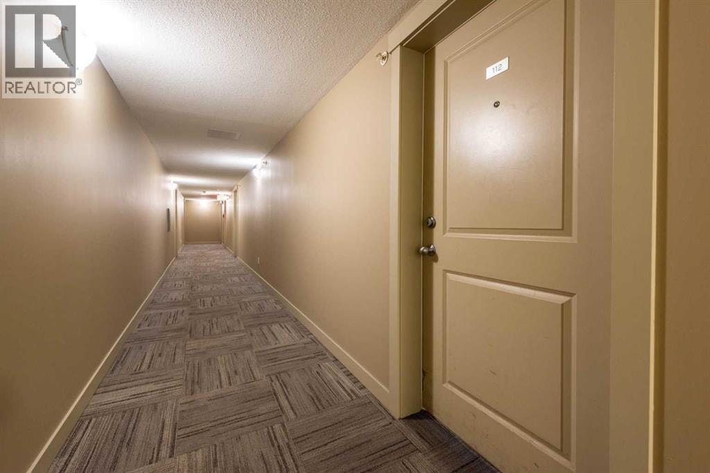 8112, 403 Mackenzie Way SE — photo 10