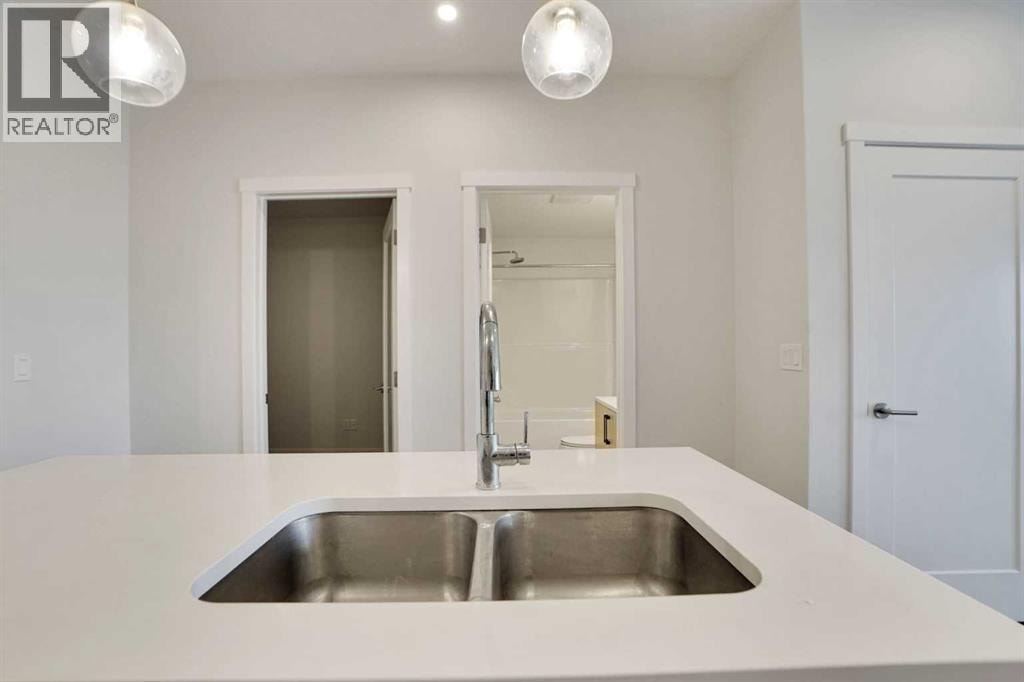 405, 138 Sage Valley Common NW — photo 13