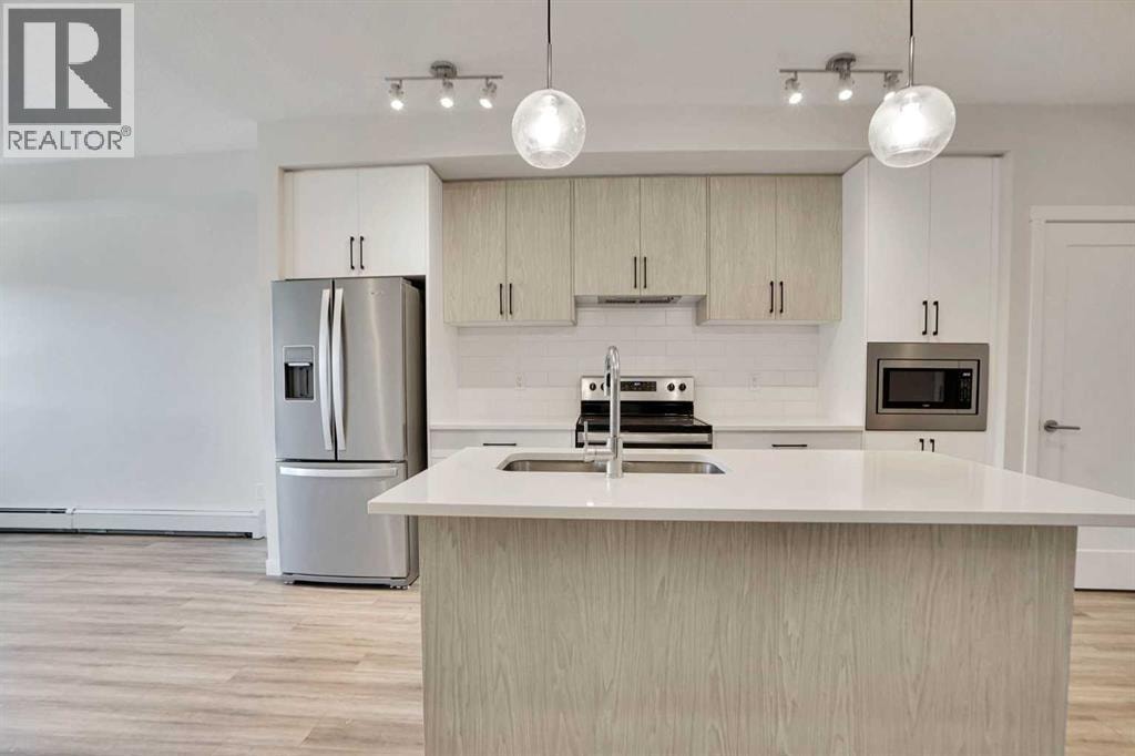 405, 138 Sage Valley Common NW — photo 12