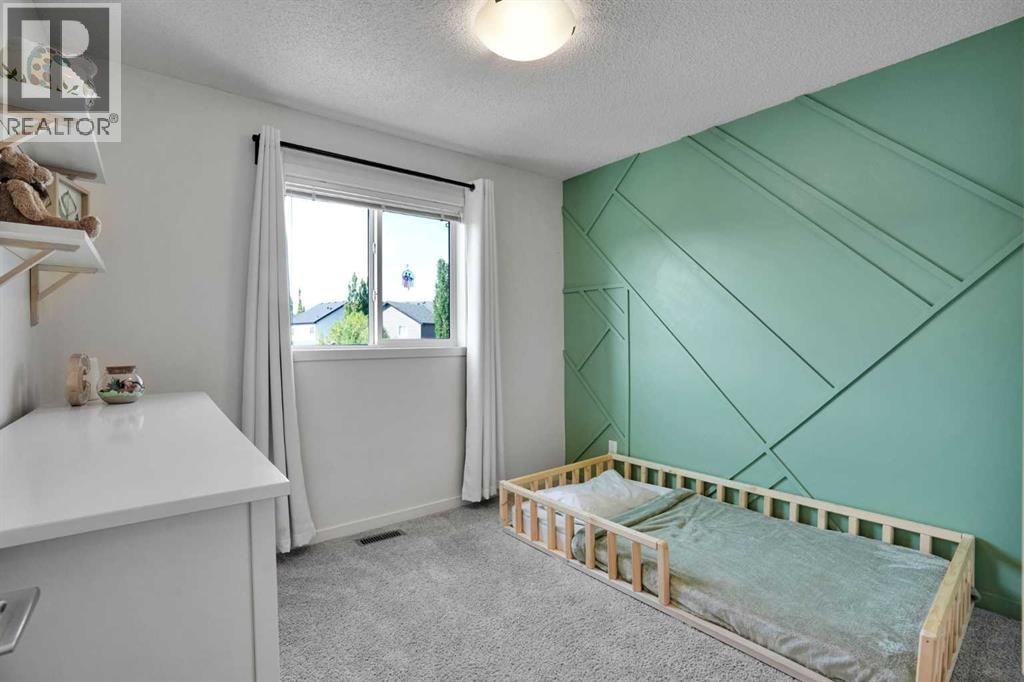 209 Copperpond Parade SE — photo 24