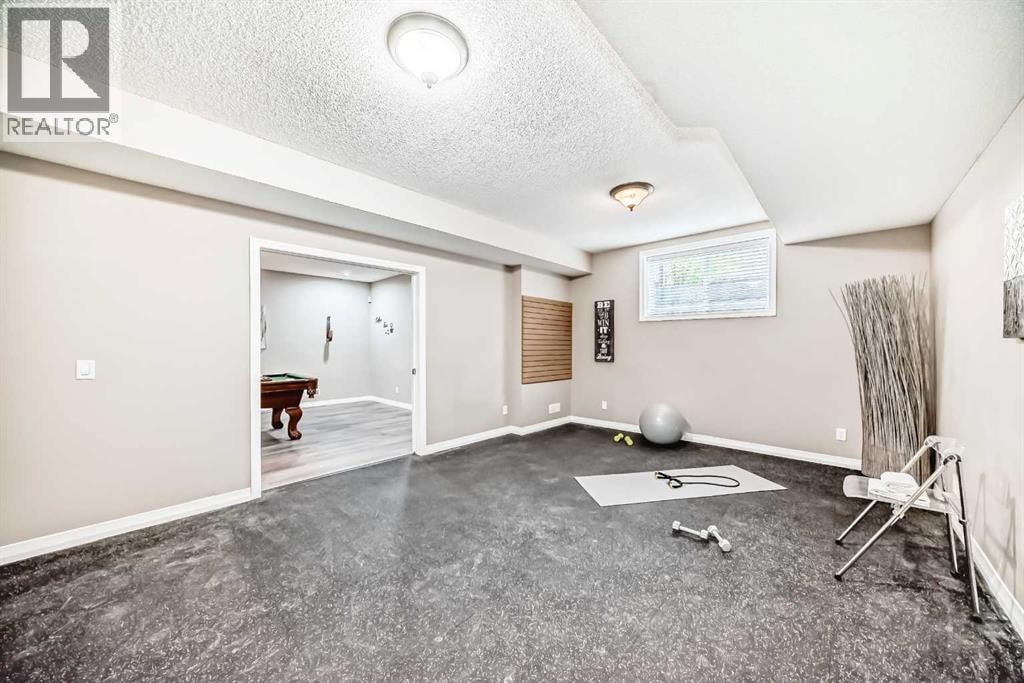 77 Chaparral Valley Grove SE — photo 31