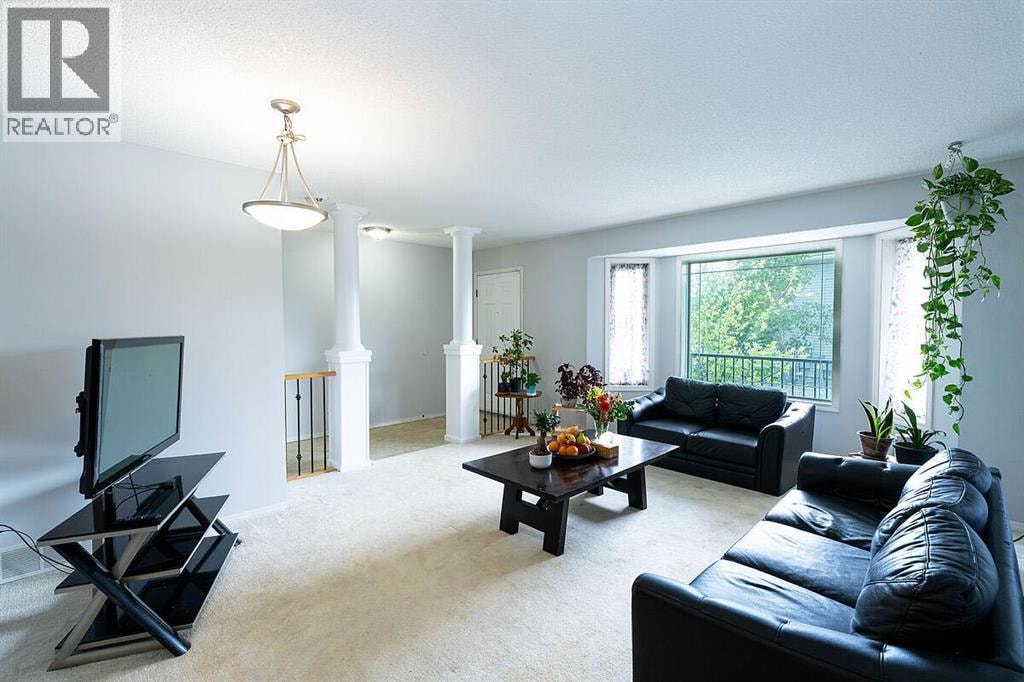 102, 950 Arbour Lake Road NW — photo 4