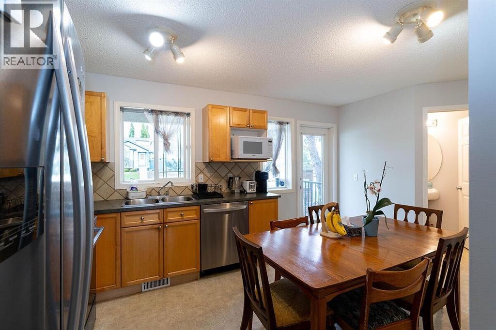 102, 950 Arbour Lake Road NW — photo 7