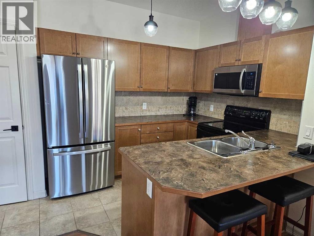 1402, 92 Crystal Shores Road — photo 3