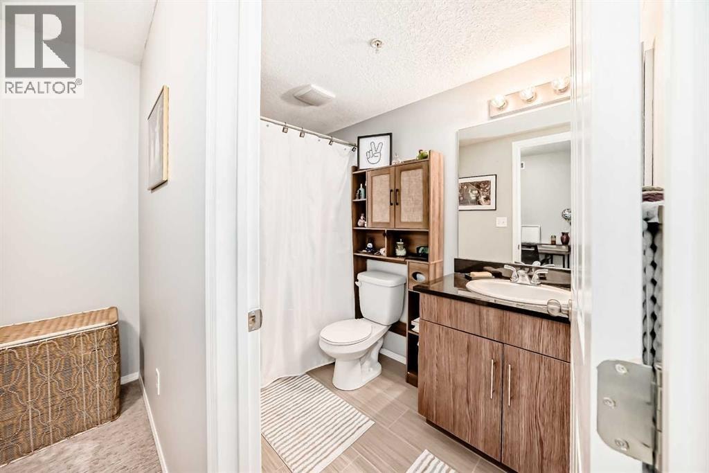 1305, 403 Mackenzie Way SW — photo 25